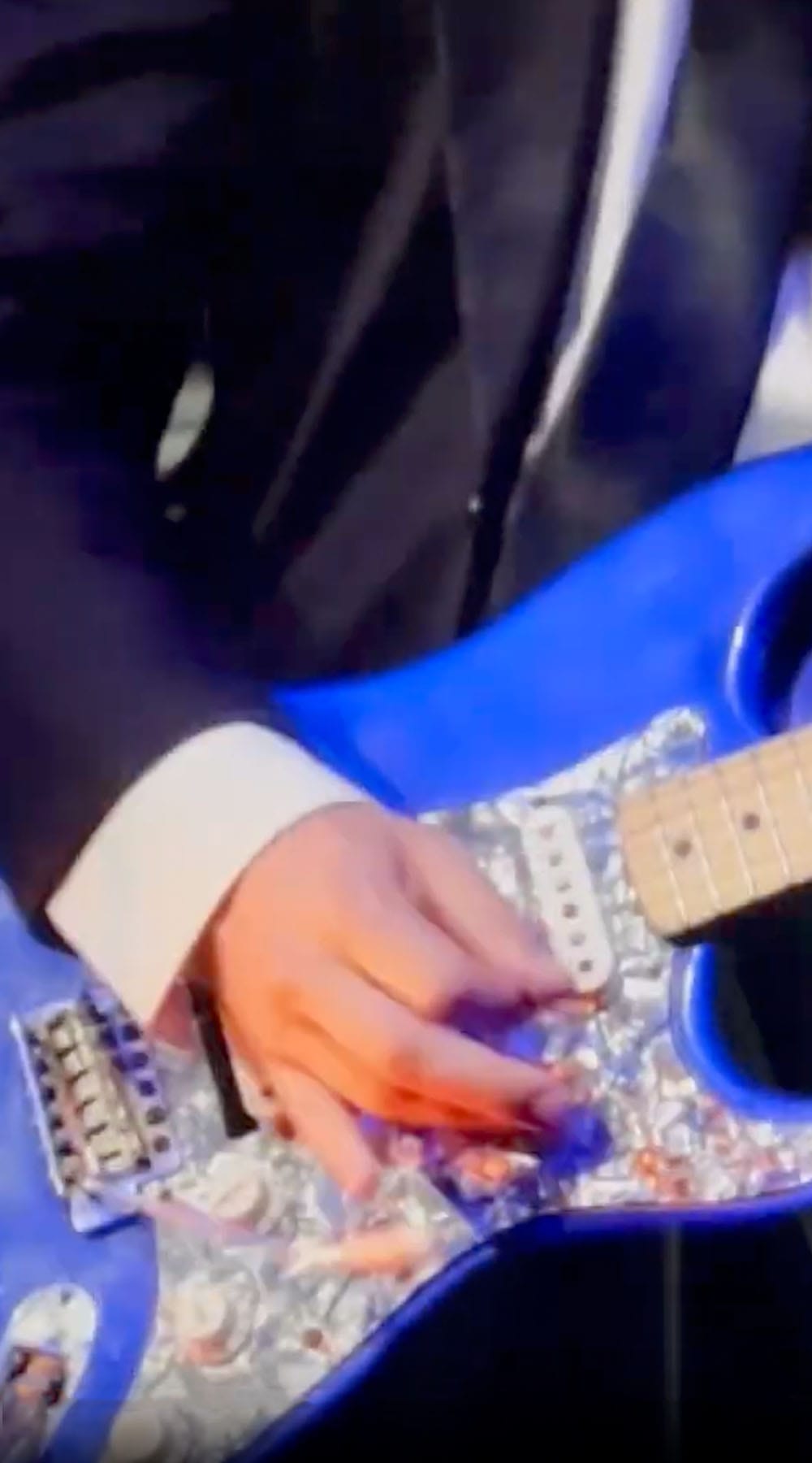 musician playing guitar